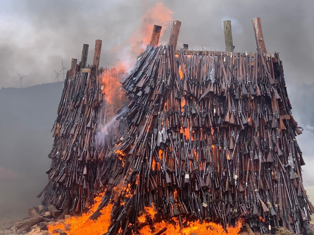 Firearms burning during destruction